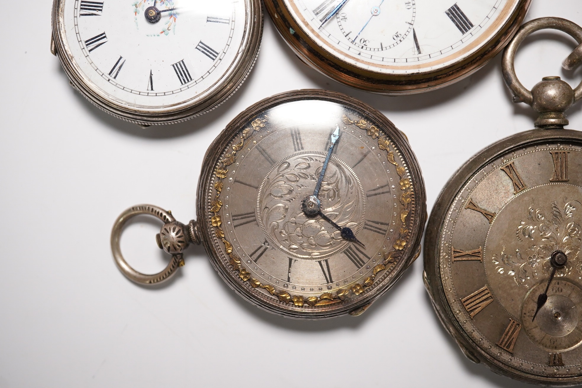 Four assorted white metal pocket watches and two other base metal pocket watches. Condition - poor to fair